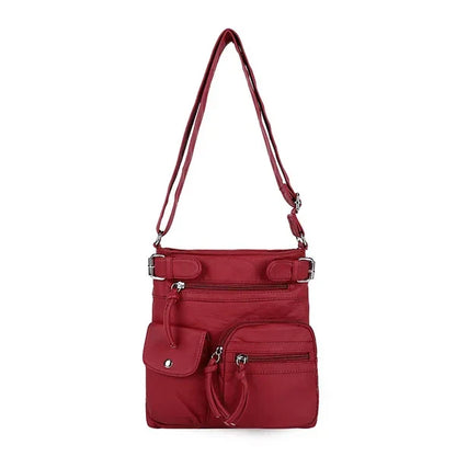 Zara | Sac à bandoulière en cuir souple à compartiments multiples.