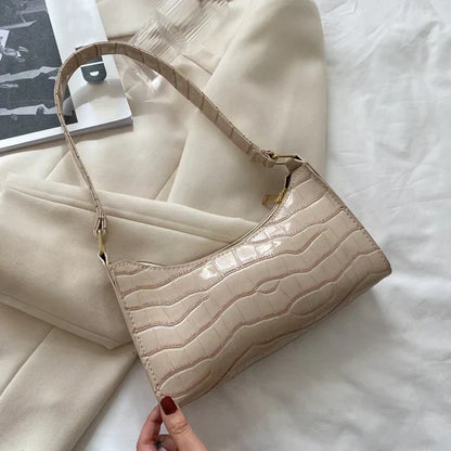 Tilly | Sac à bandoulière brillant avec motif en alligator