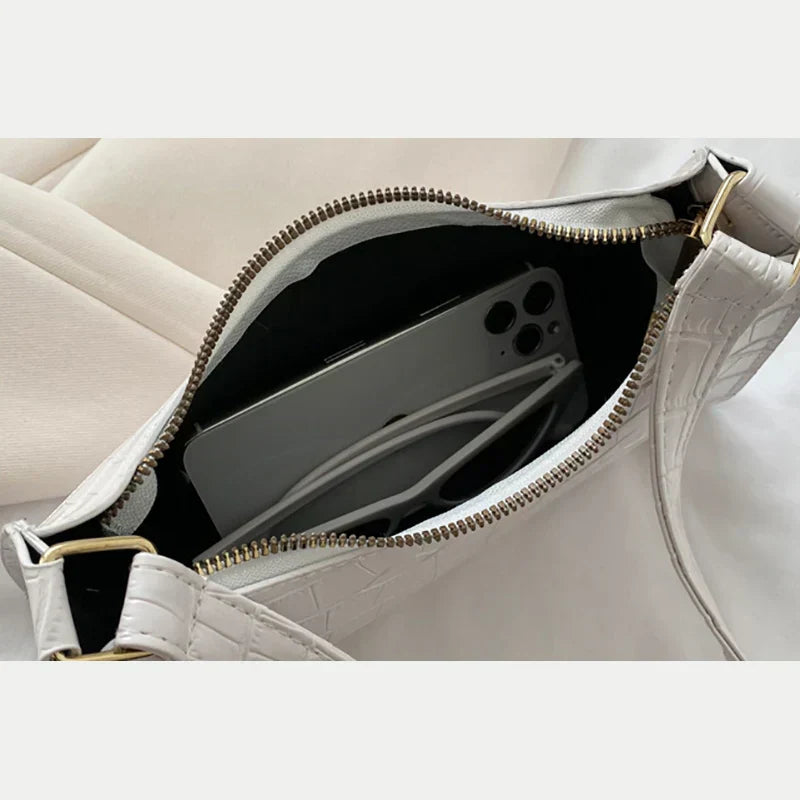 Tilly | Sac à bandoulière brillant avec motif en alligator