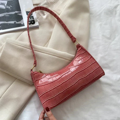 Tilly | Sac à bandoulière brillant avec motif en alligator