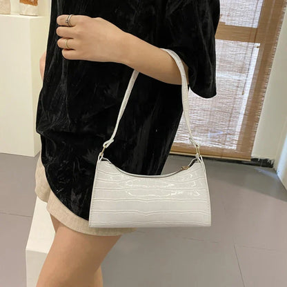 Tilly | Sac à bandoulière brillant avec motif en alligator