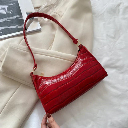 Tilly | Sac à bandoulière brillant avec motif en alligator