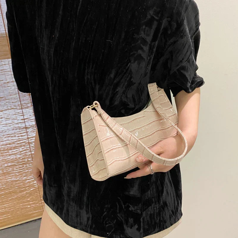 Tilly | Sac à bandoulière brillant avec motif en alligator