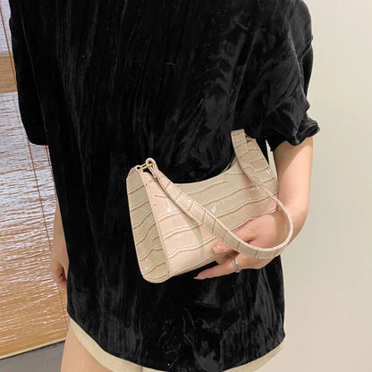 Tilly | Sac à bandoulière brillant avec motif en alligator
