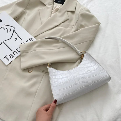 Tilly | Sac à bandoulière brillant avec motif en alligator
