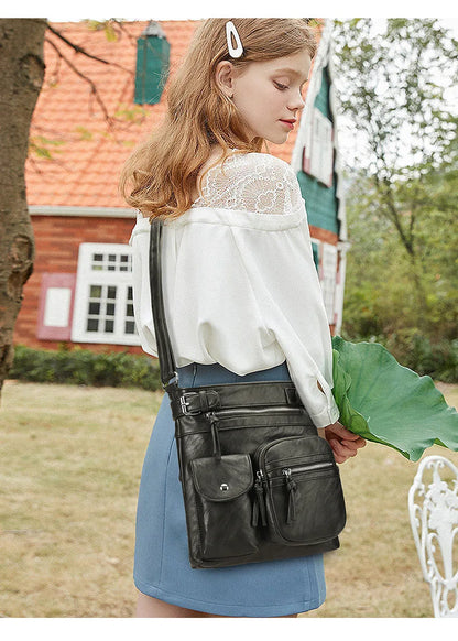 Zara | Sac à bandoulière en cuir souple à compartiments multiples.