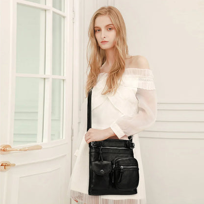 Zara | Sac à bandoulière en cuir souple à compartiments multiples.
