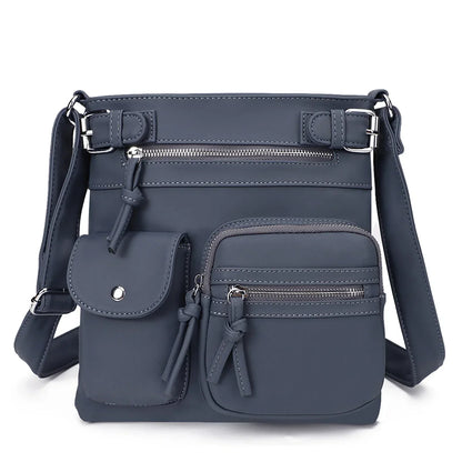 Zara | Sac à bandoulière en cuir souple à compartiments multiples.