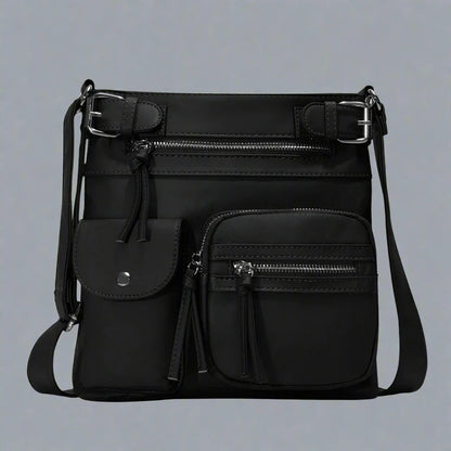 Zara | Sac à bandoulière en cuir souple à compartiments multiples.