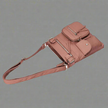 Zara | Sac à bandoulière en cuir souple à compartiments multiples.
